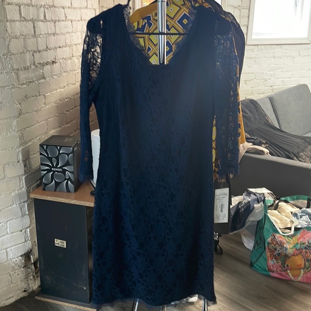 Navy blue lace — never worn. Classic with a touch of oh my sexy.